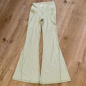 Fabletics, bell bottom yoga pants. New with tags. Green & White check. Size XS